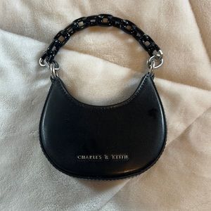 Charles & Keith koi chain handle mini bag